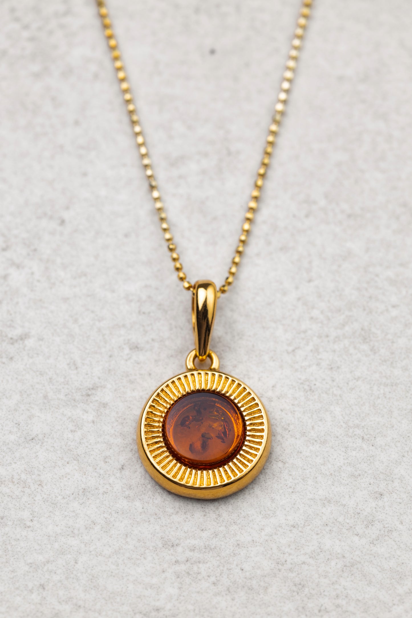 Gold-Plated Amber Pendant with Honey-Colored Amber "Aurora Baltica Gold"