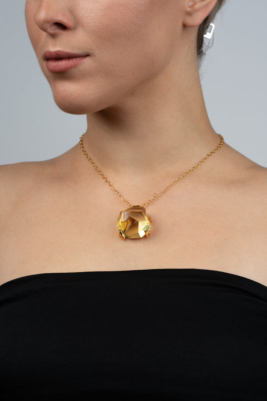 Išskirtinis paauksuotas skaidraus gelsvo gintaro pakabukas „Crista Solis“