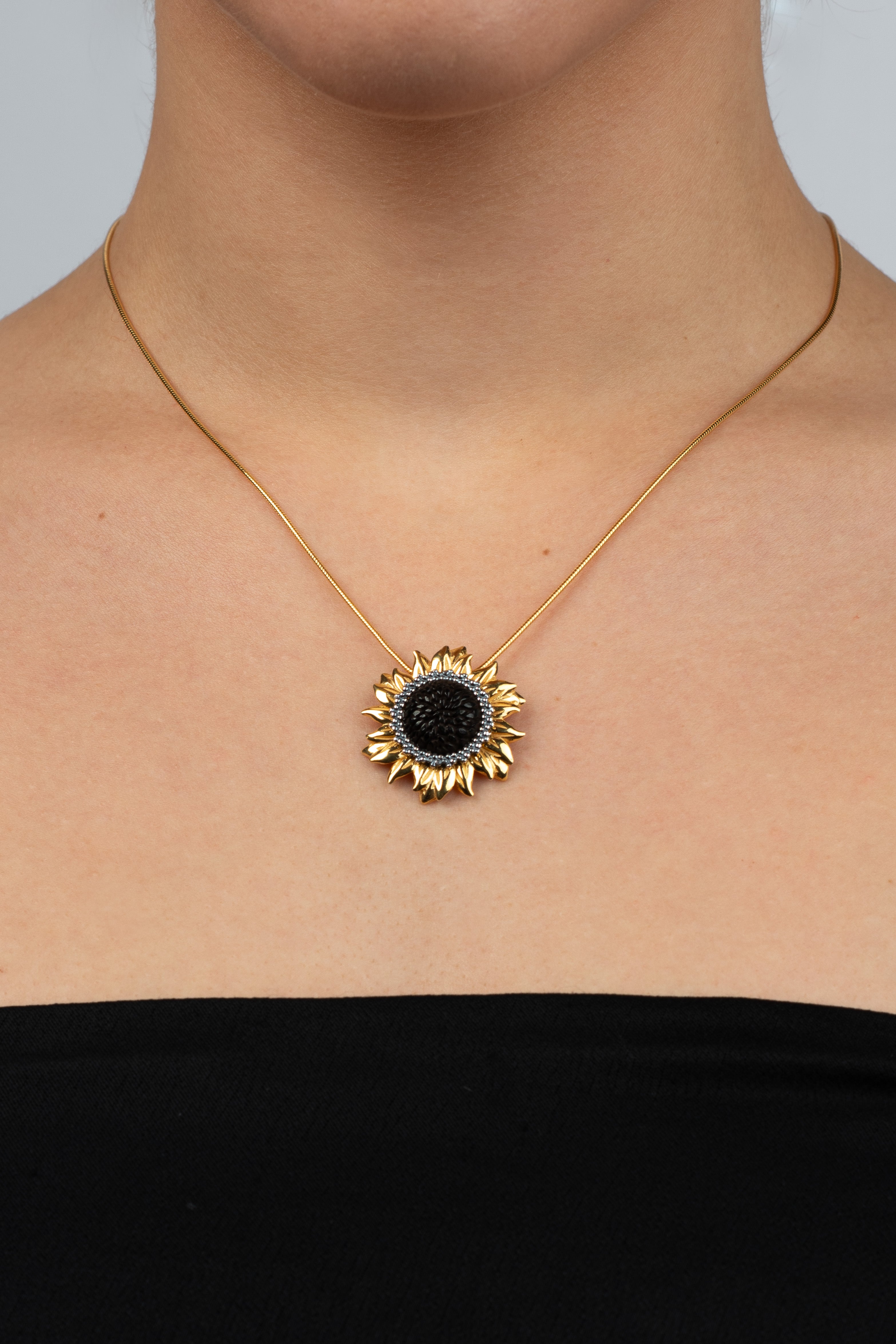 Gold-Plated Pendant with Unpolished Cherry Amber "Heliantha Noctis"
