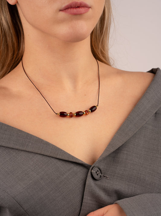 Paauksuotas vyšninio gintaro vėrinys „Anima Trinitatis“