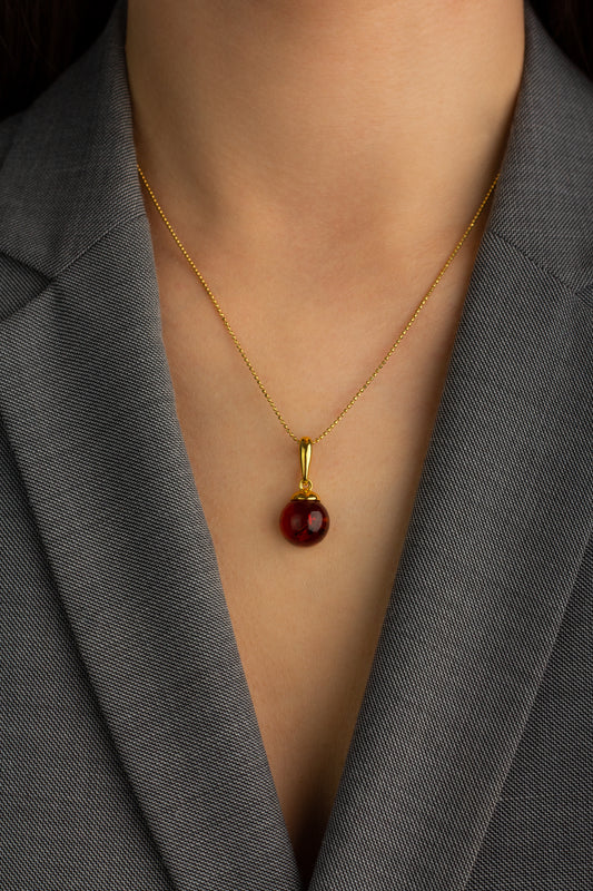 Pauksuotas gintaro pakabukas su konjako spalvos gintaru „Aurum Perla Orbis“