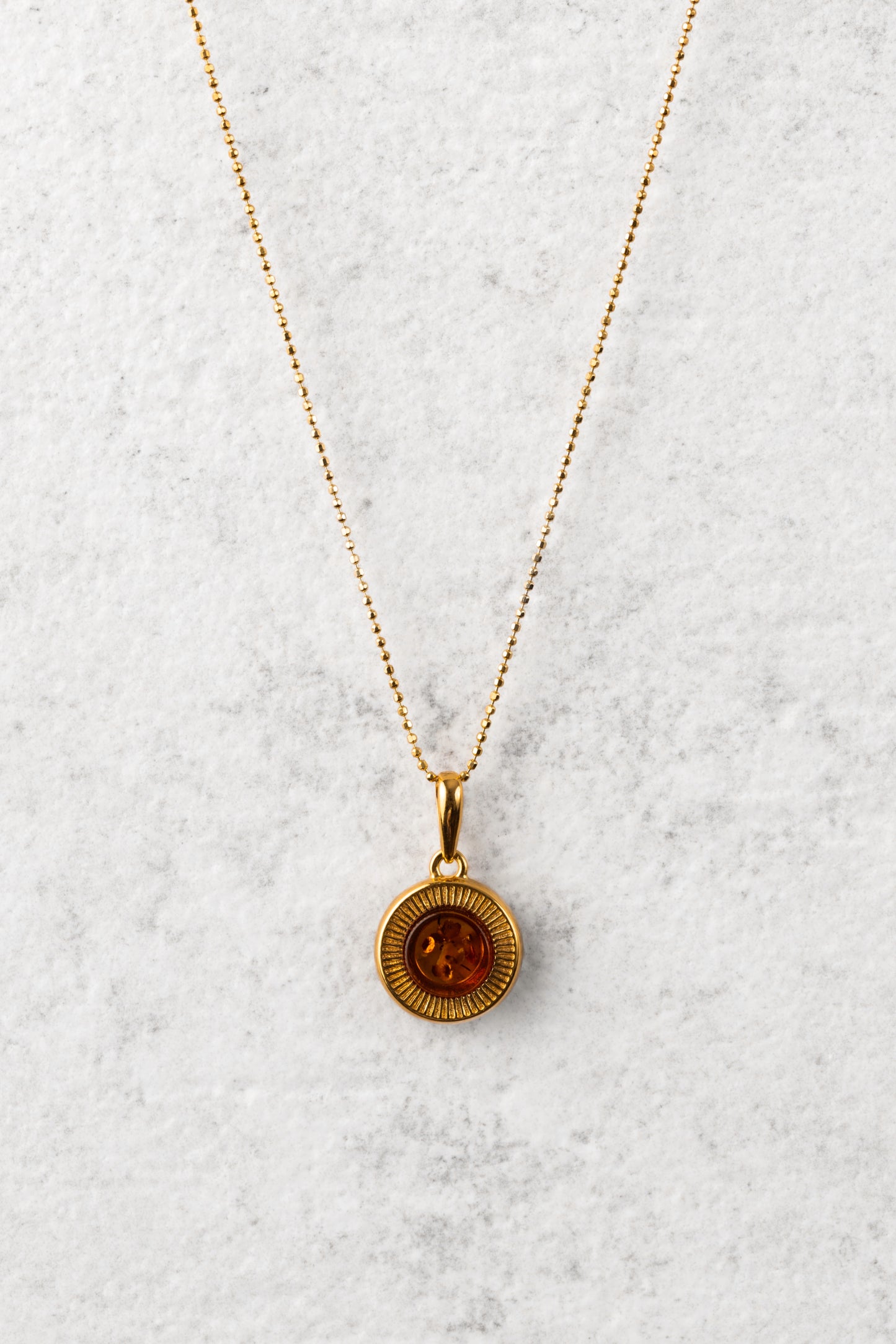 Gold-Plated Amber Pendant with Honey-Colored Amber "Aurora Baltica Gold"