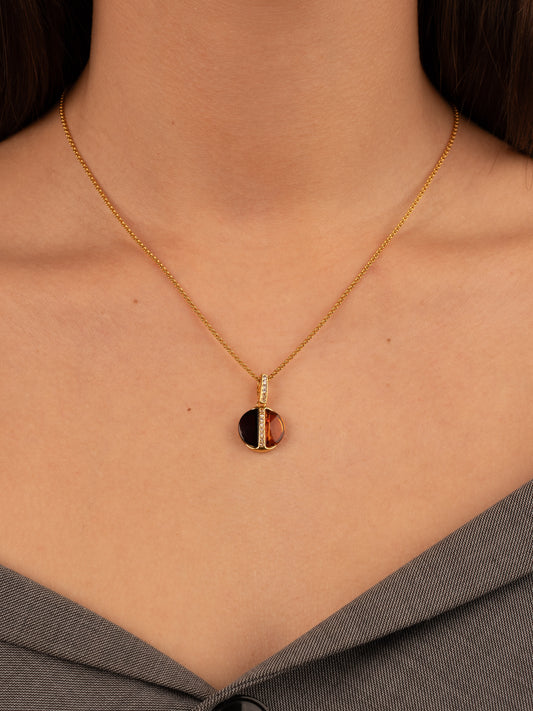 Paauksuotas medaus ir vyšninės spalvos gintaro pakabukas „Gemina Lux“