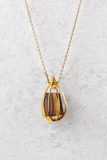 Luxurious Gold-Plated Pendant with Honey-Colored Amber “Aetheris Spatium”
