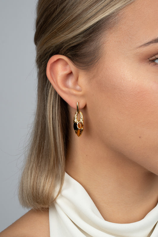 Modernūs paauksuoti gintaro auskarai „Lacrima Solis“