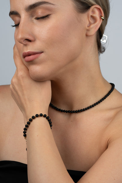 Paauskuotas gintaro pakabukas su matiniu vyšniniu gintaru "Ignis Nox"