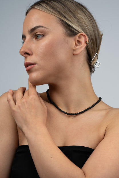 Paauskuotas gintaro pakabukas su matiniu vyšniniu gintaru "Ignis Nox"