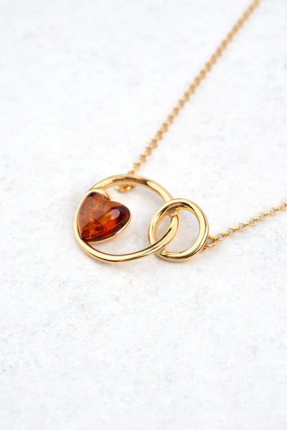 Paauksuotas gintarinis pakabukas su medaus spalvos gintaru „Nodus Amor“