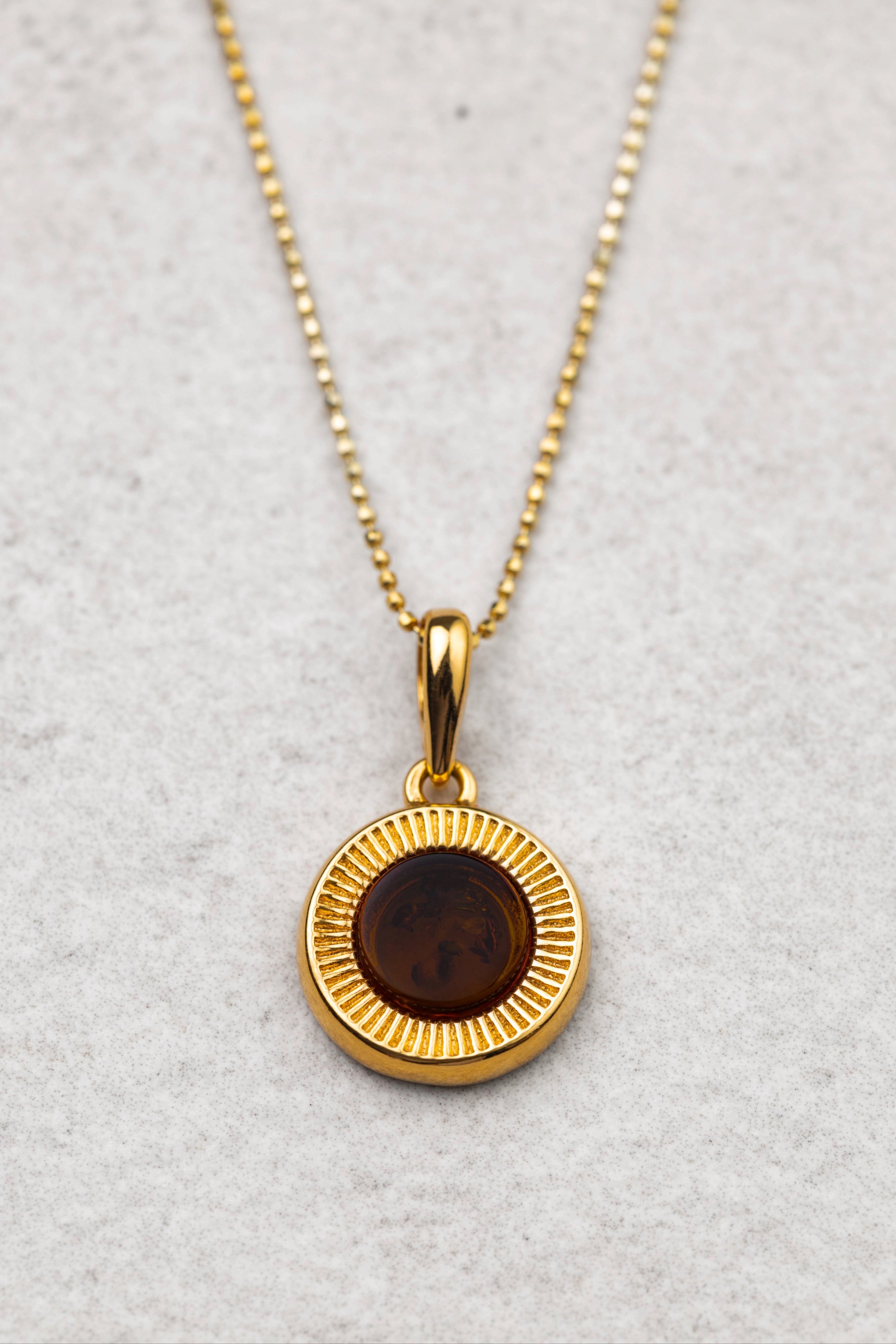 Gold-Plated Amber Pendant with Cherry Amber "Aurea Solis"
