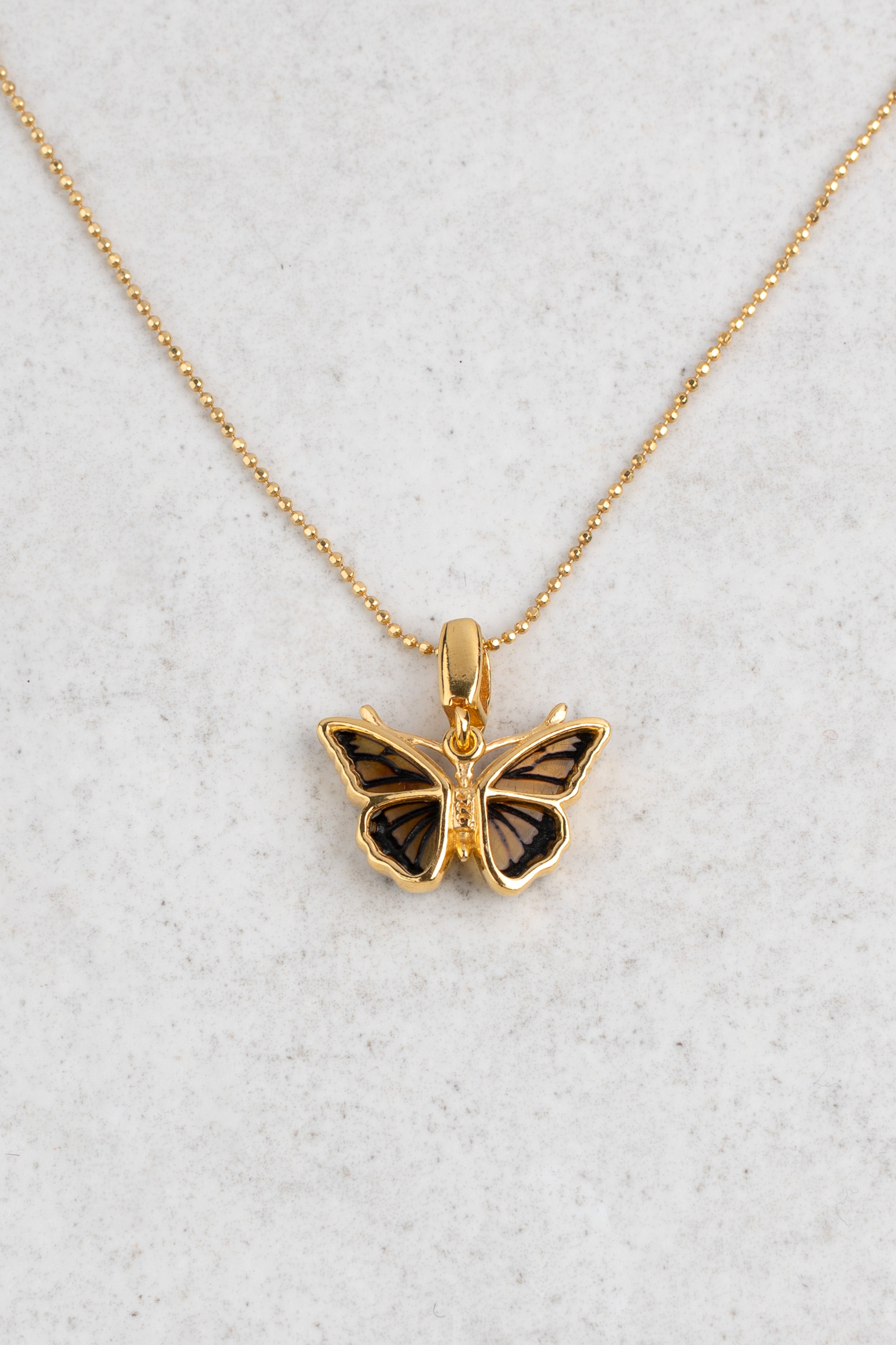 Skaidraus gintaro pakabukas „Aurea Papilio“