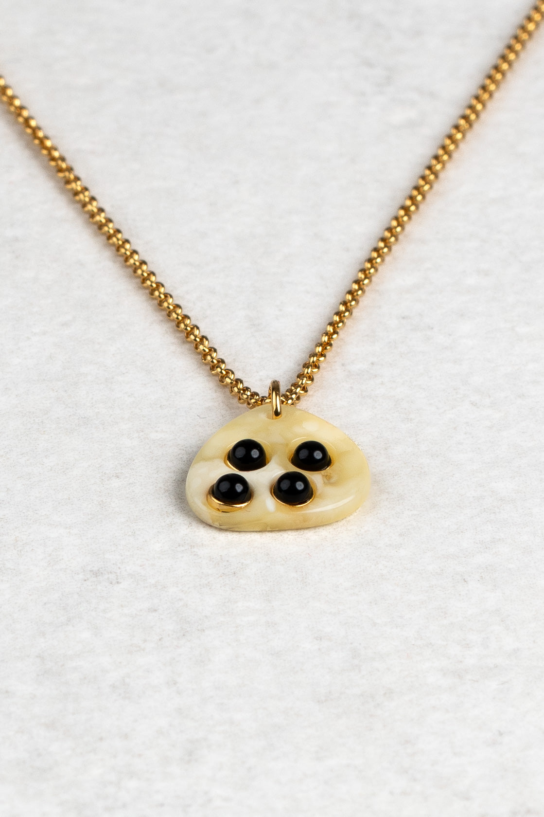 Minimalist Gold-Plated Pendant with Milky Baltic Amber "Obsidian Harmony"