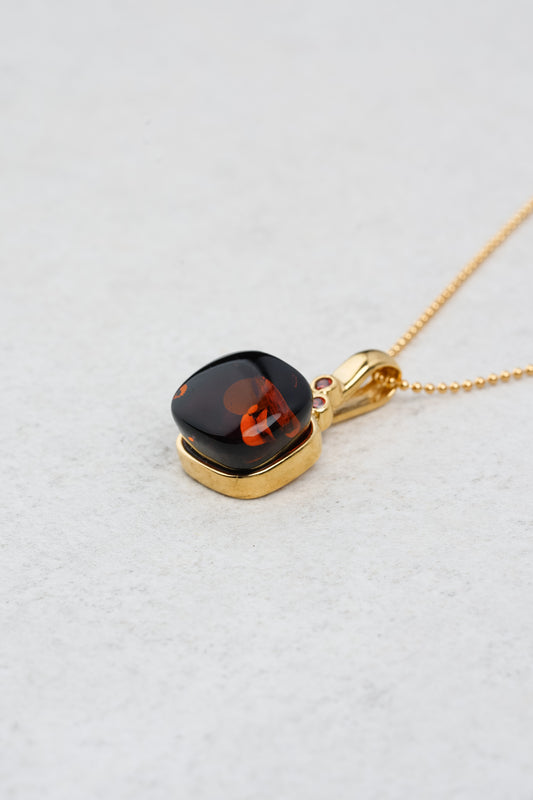 Luxurious Gold-Plated Pendant with Cherry Amber "Aurum Umbrae"